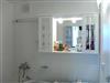 Moderně zrenovovaná koupelna bytového umakartového jádra bez bourání, technologií vícevrstvých nástřiků a nátěrů.